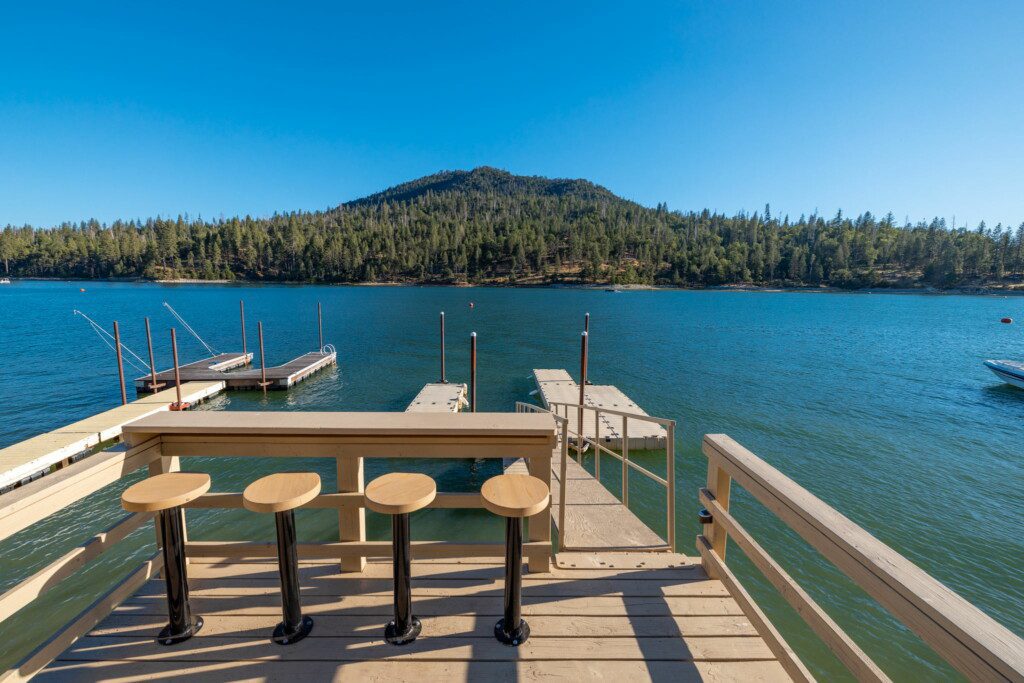 Things to do at Bass Lake for first-time visitors, including staying in a cozy lakefront cabin surrounded by nature.