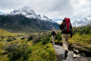 Two hikers enjoying the easy hiking trails Oakhurst with scenic mountain views
