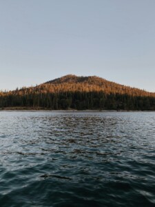Scenic day trips from Bass Lake with clear lake views and lush forest landscape
