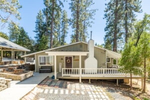 A exterior view of a Thayne Wyoming vacation rentals home with a mountain backdrop