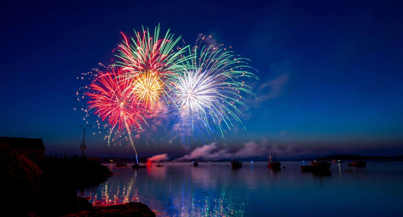 Spectacular fireworks show over the water during the Bass Lake 4th of July celebration.